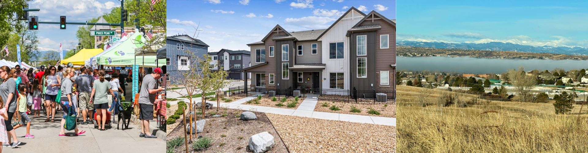 A group of people walking on a sidewalk next to a body of water.