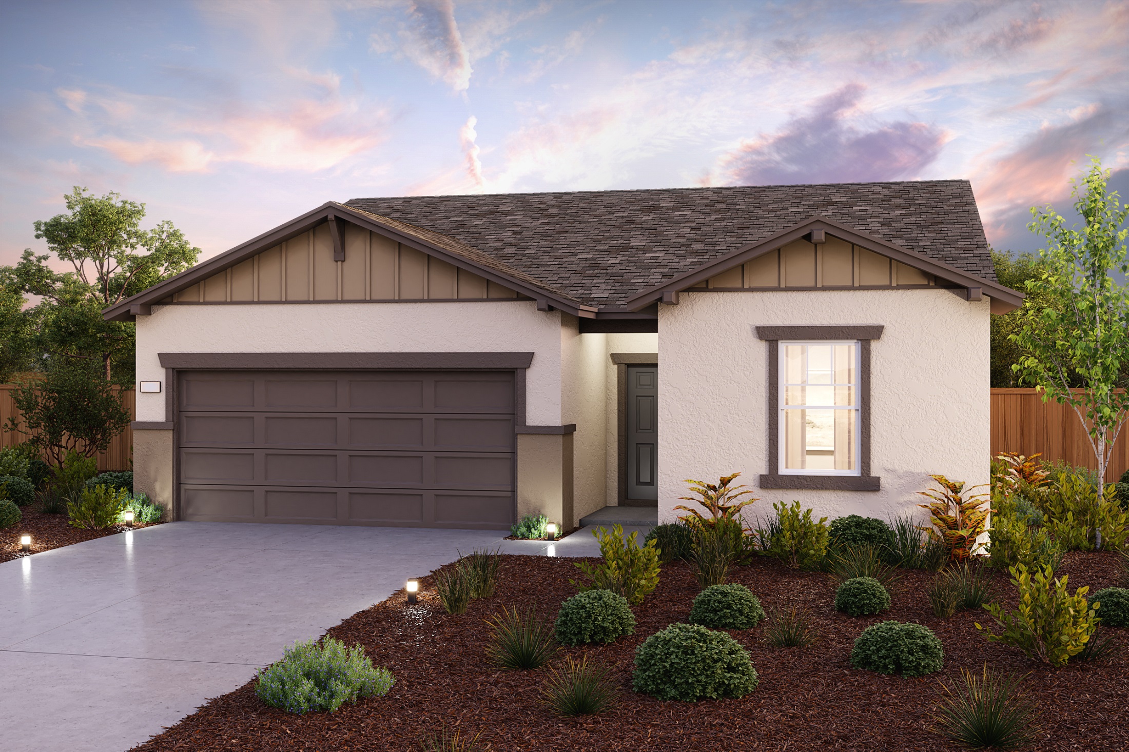 A house with a garage and a driveway.