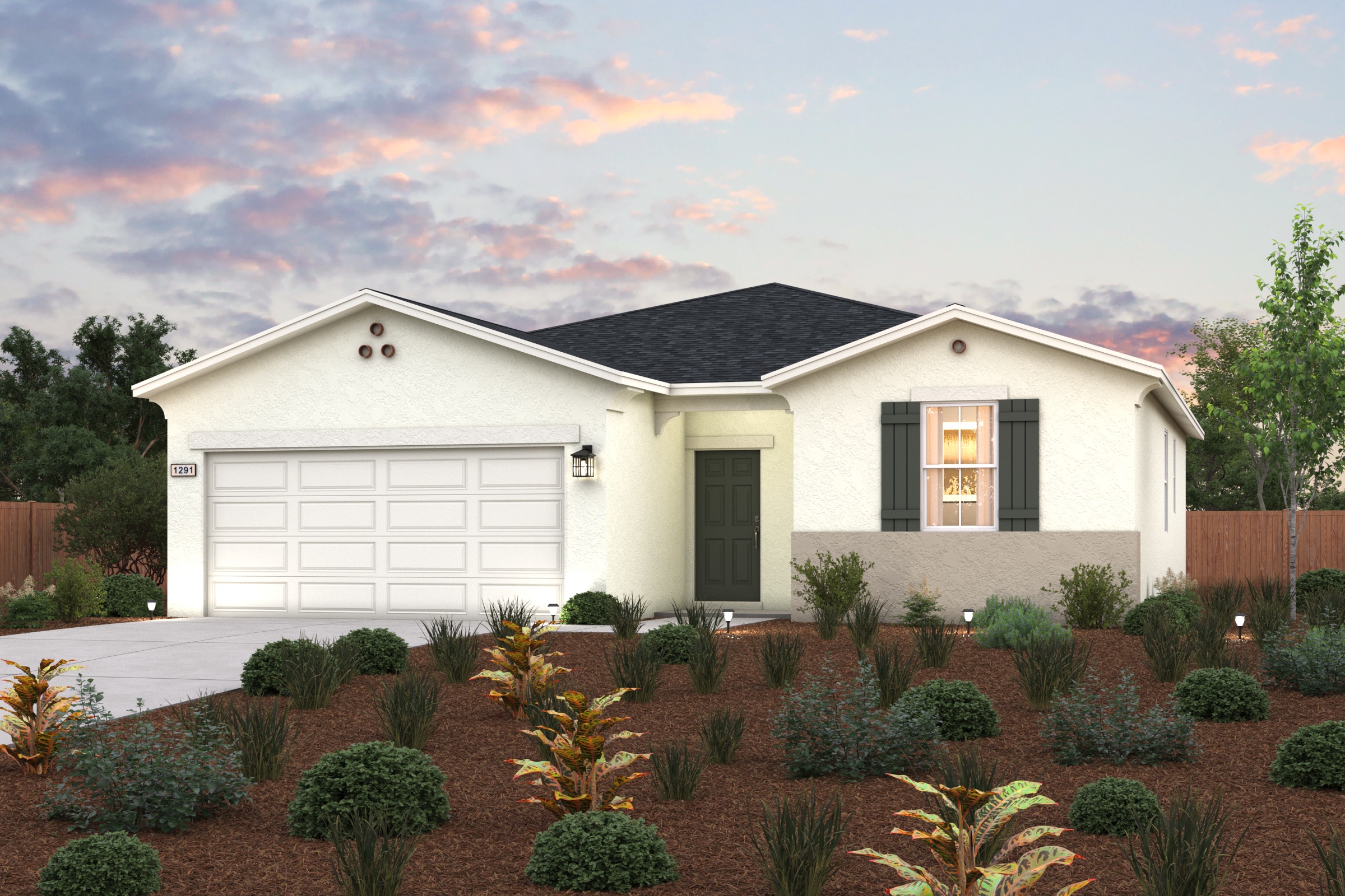 A house with bushes in front of it.