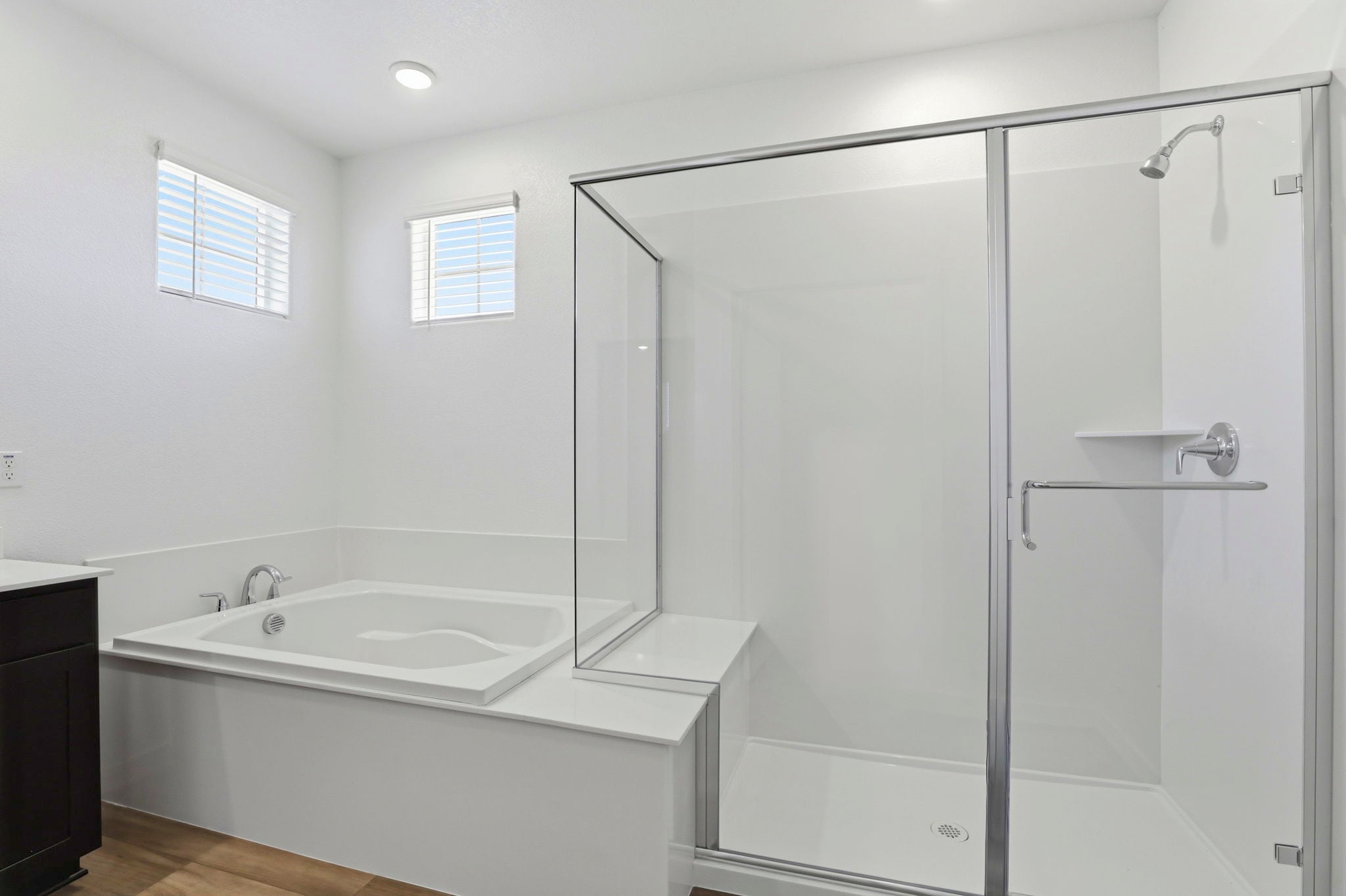 A bathroom with a glass shower.
