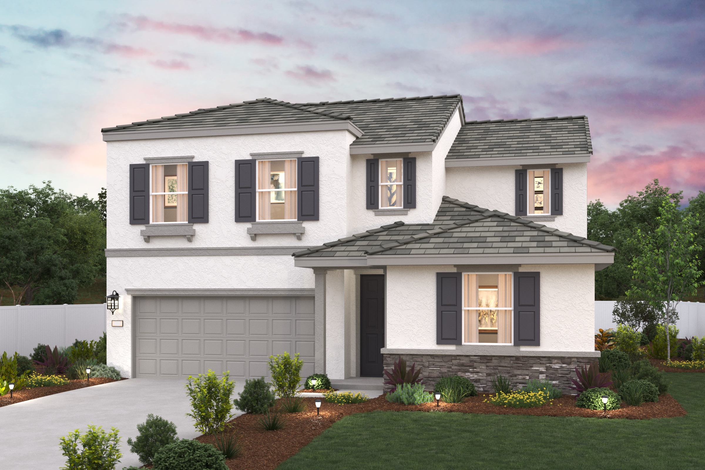 A white house with a driveway.