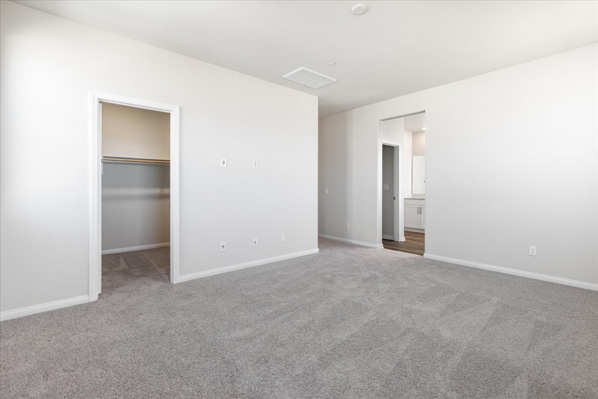 A hallway with a door.