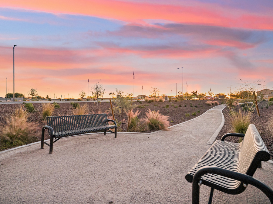 Benches on a sidewalk.