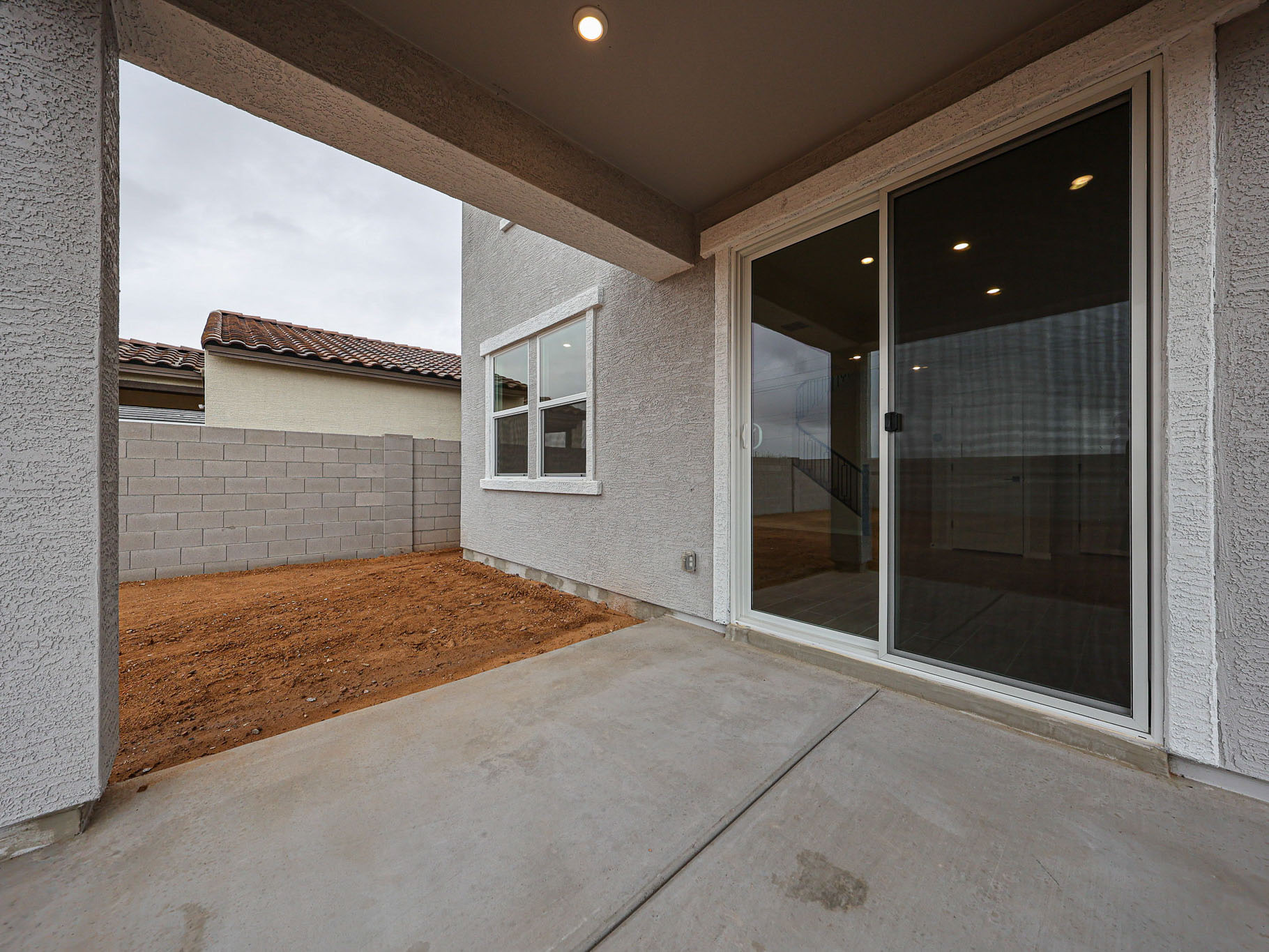 A room with a glass door.