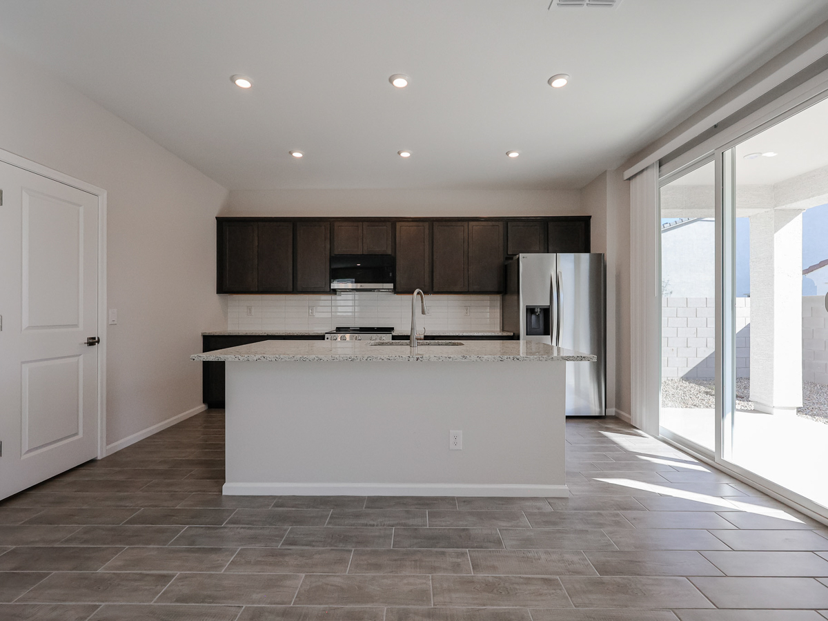 A kitchen with a large island.