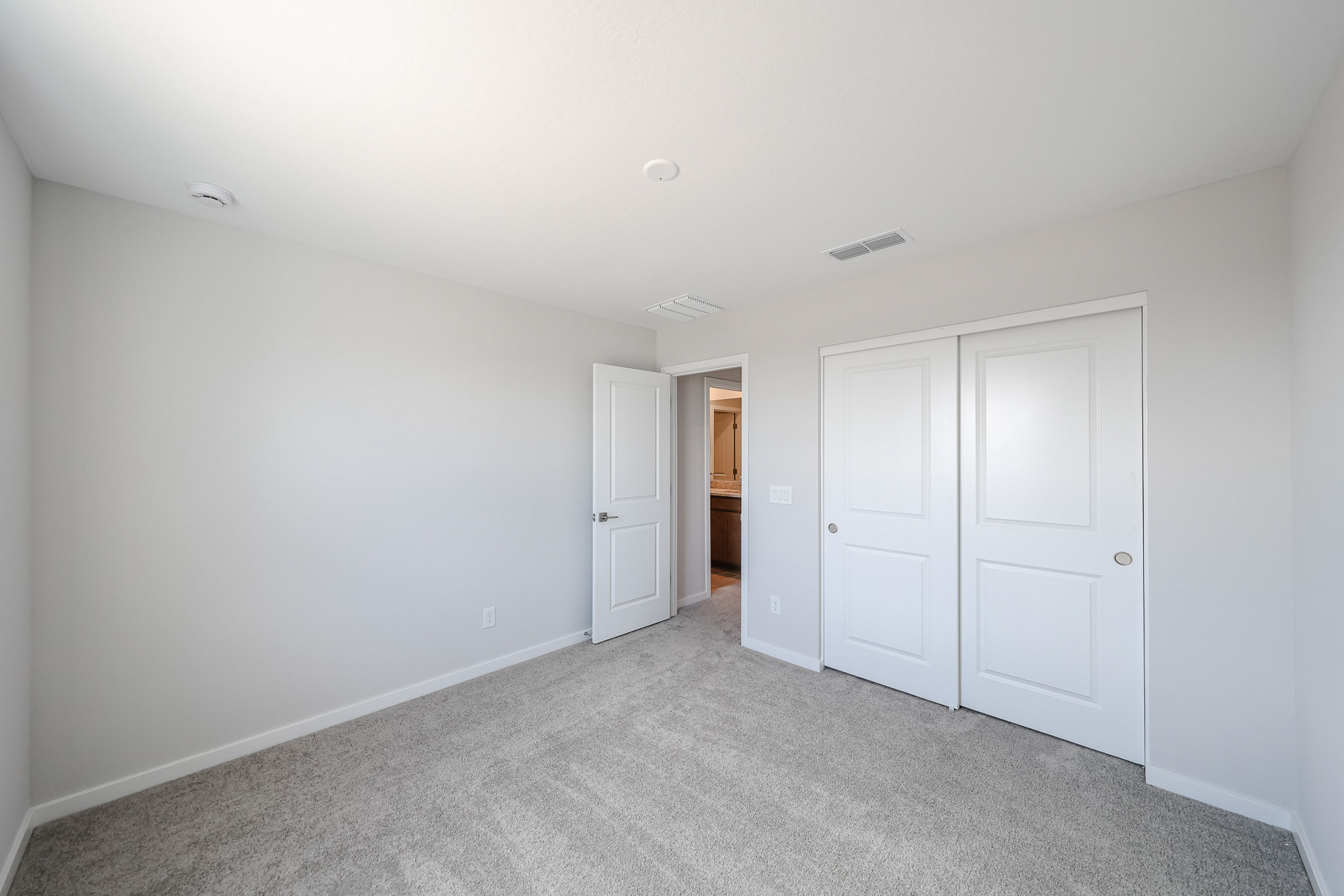 A room with white doors.