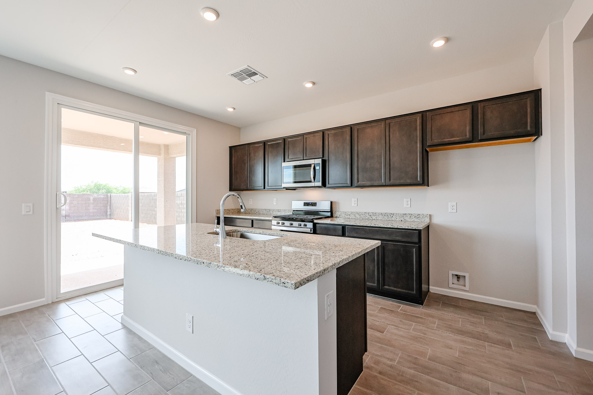 A kitchen with a large island.