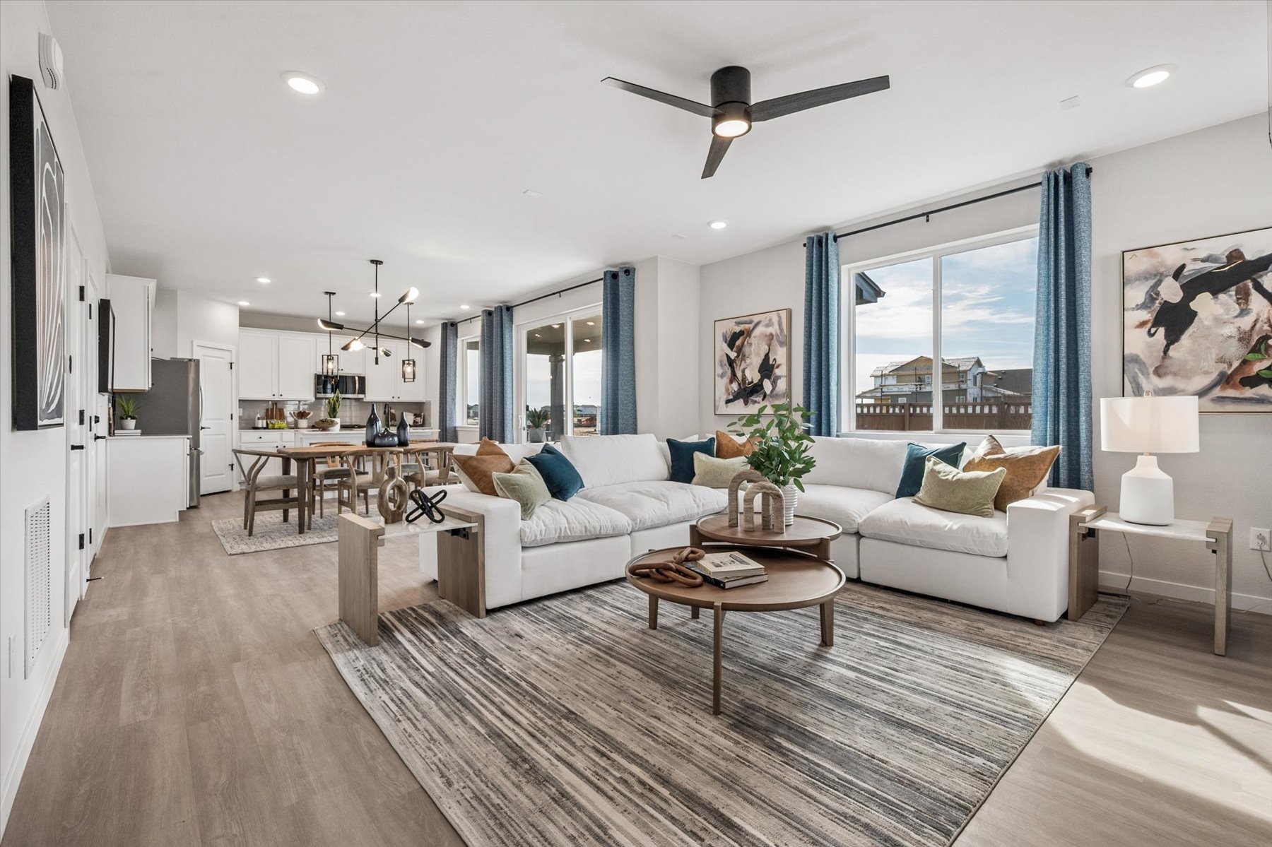 A living room with a large window.