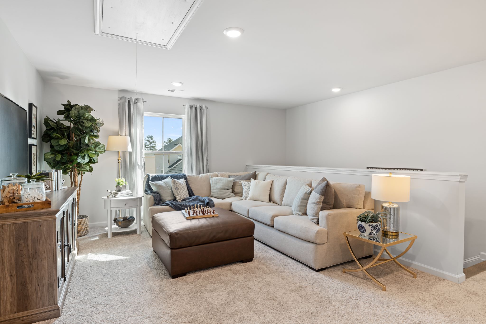 A living room with a couch and a coffee table.