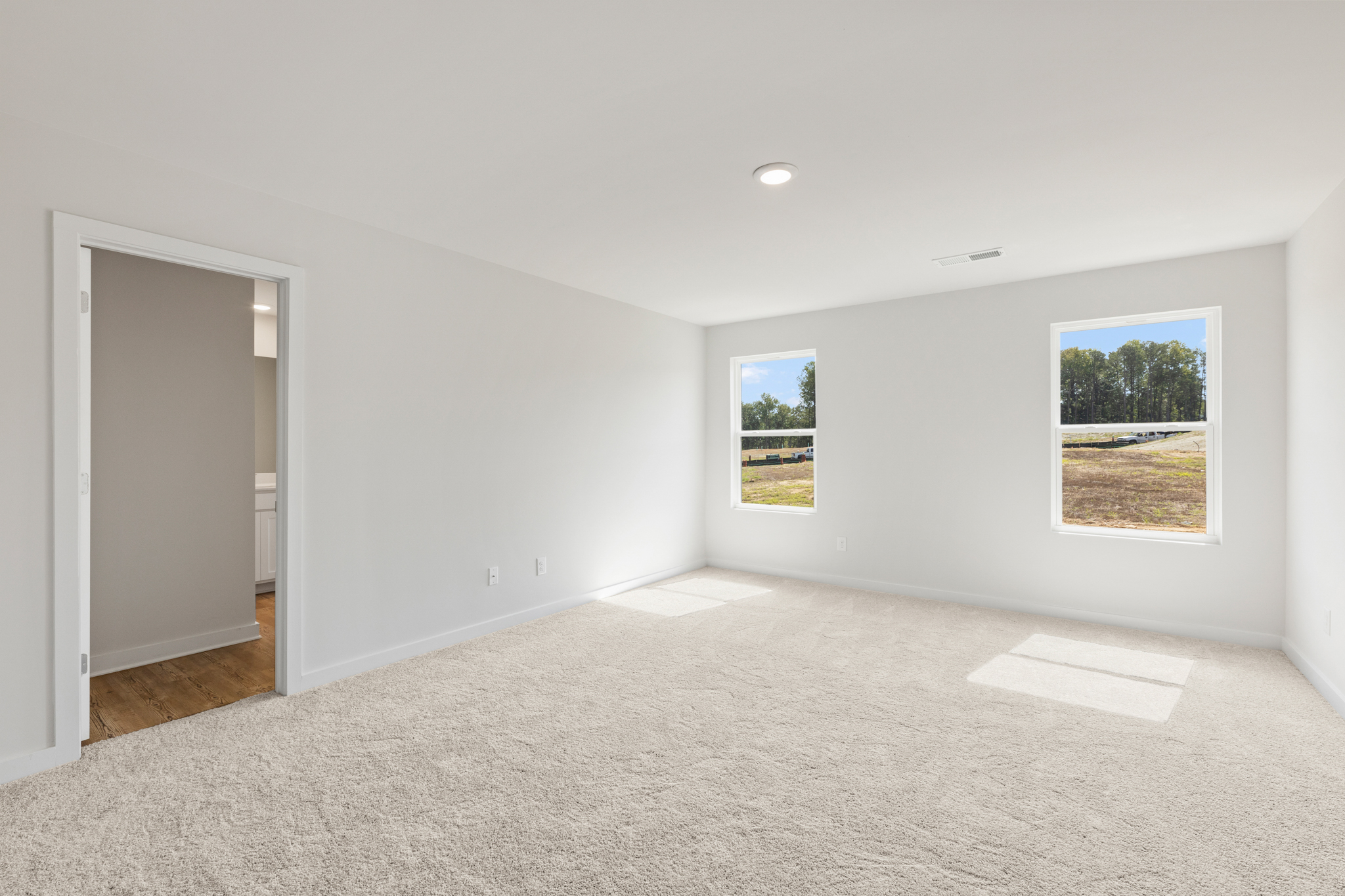 A room with a door and a window.