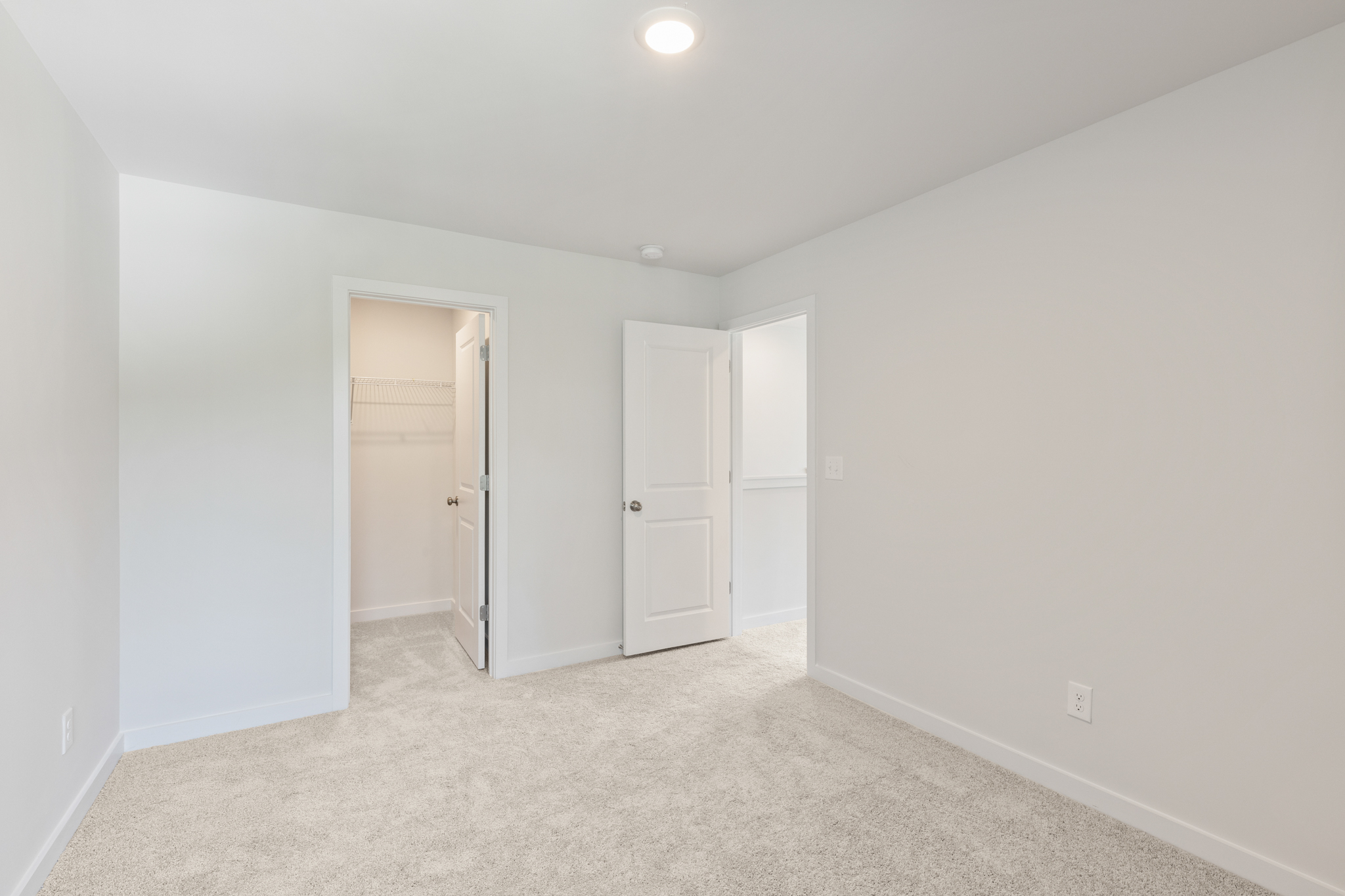 A room with white doors.