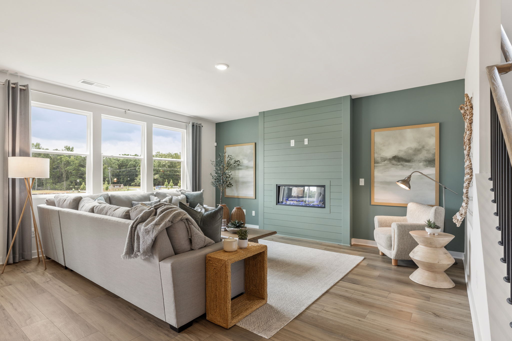 A living room with a couch and a table.