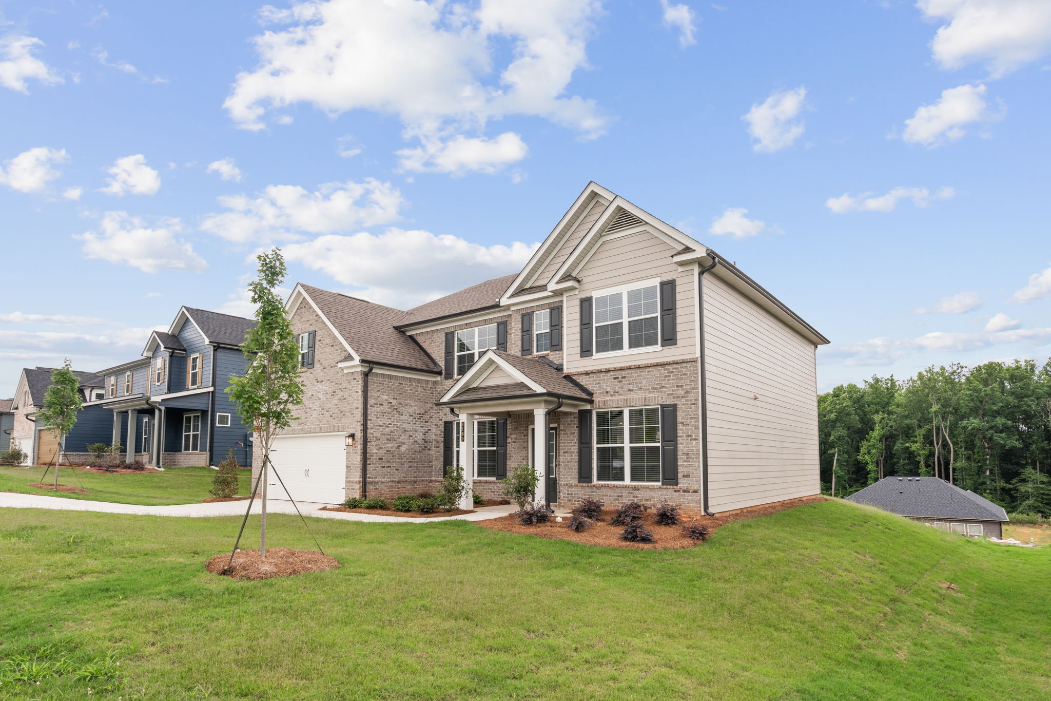 A house with a large front yard.