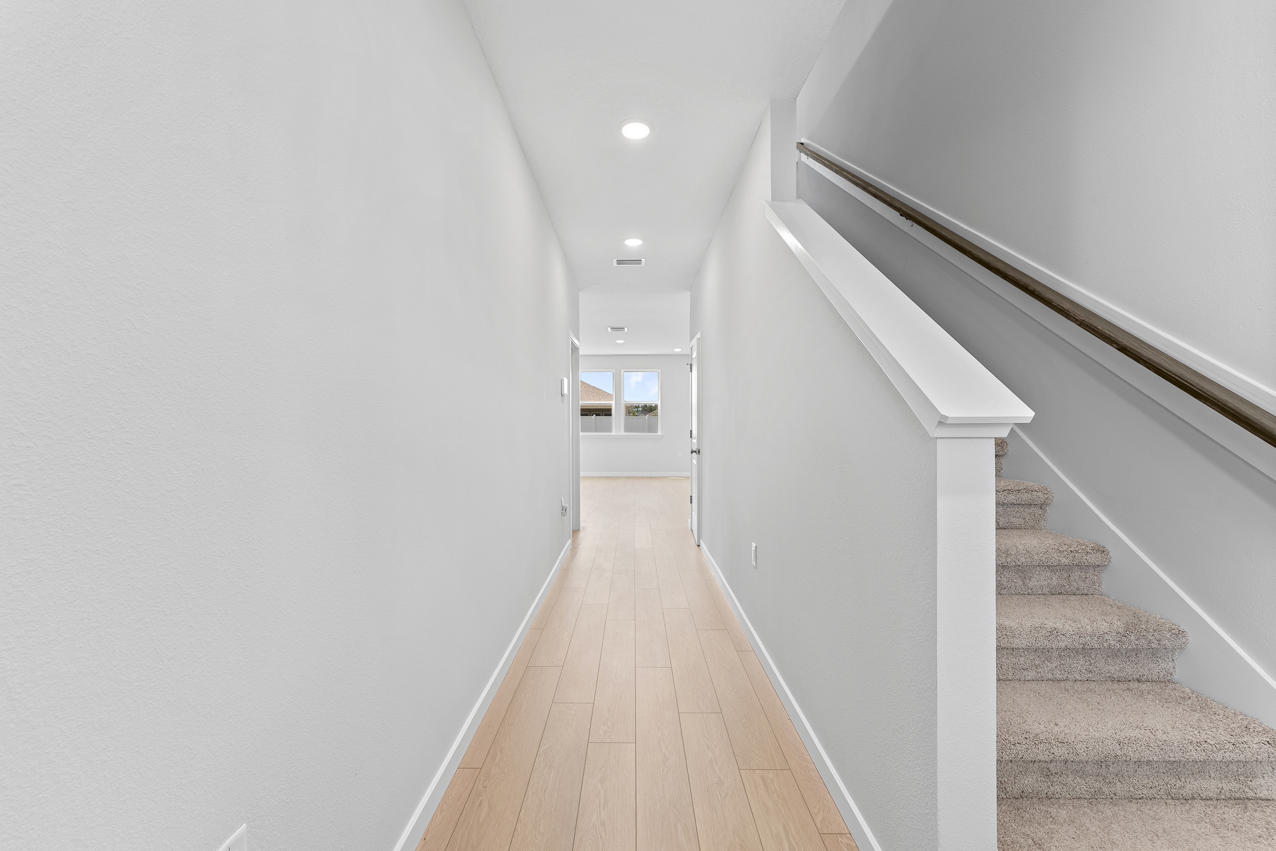 Lot 20 Ponderosa II Entryway with Hallway and Stairs at Camden Woods in Kingsland, GA