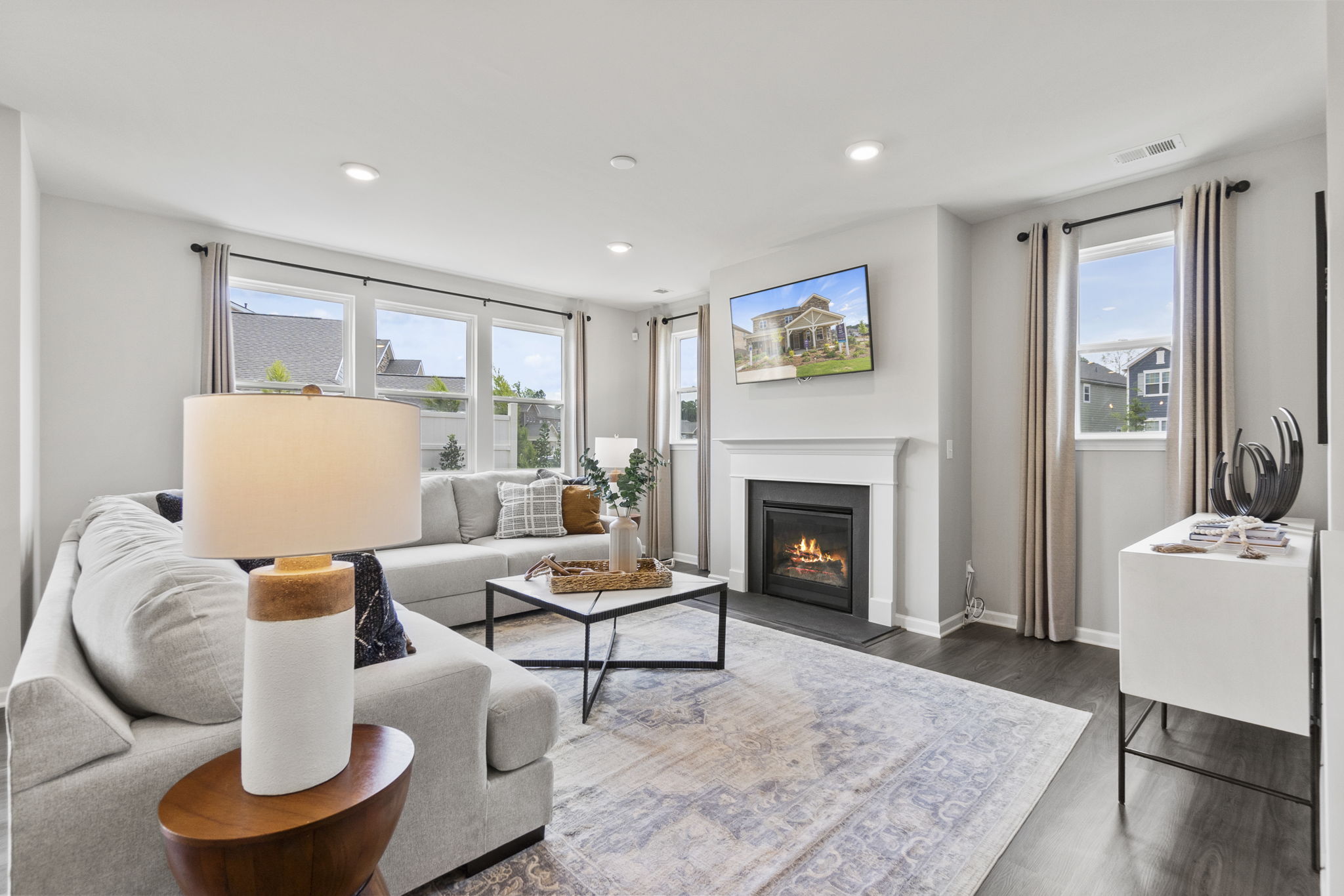 A living room with a fireplace.