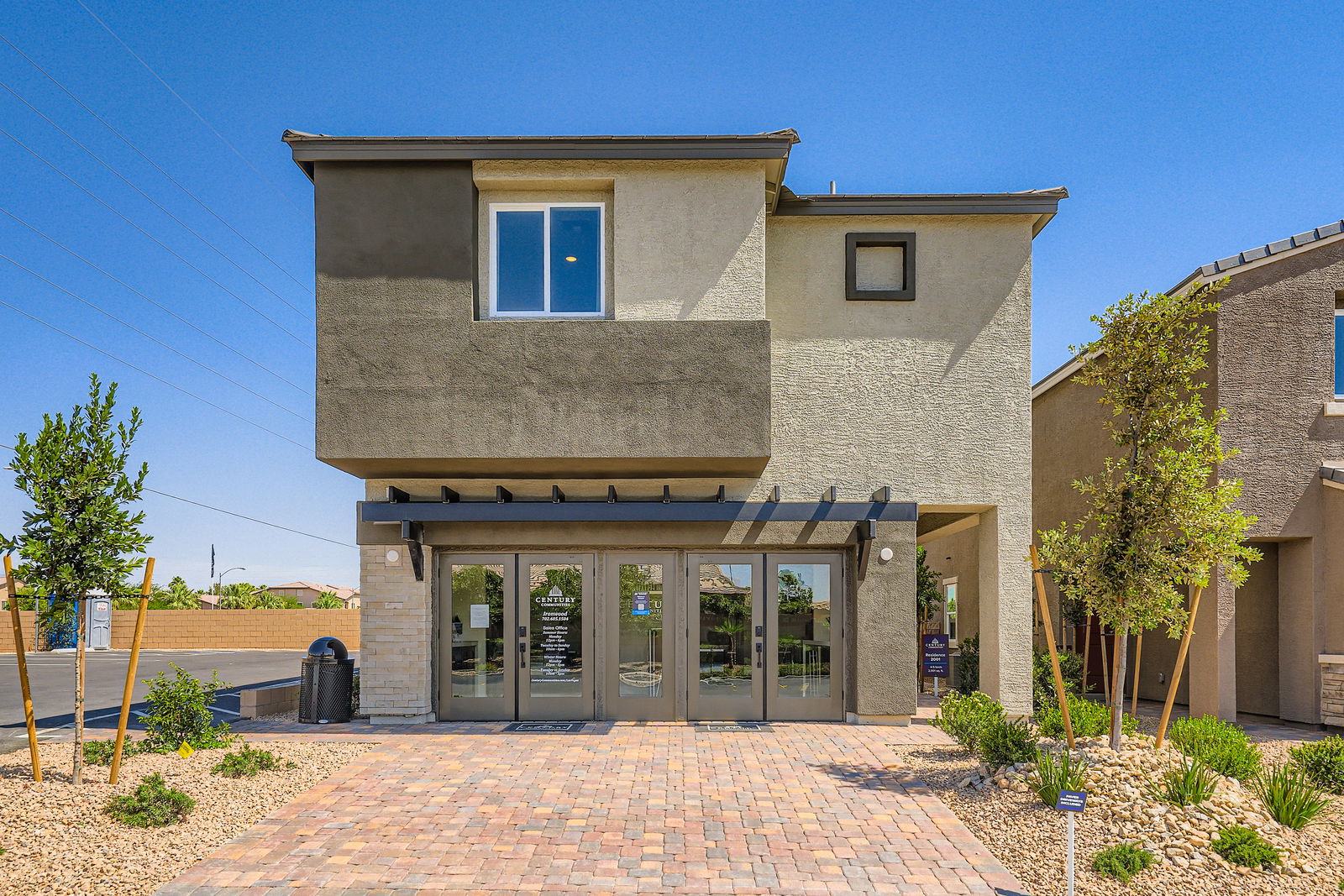 A house with a brick driveway.
