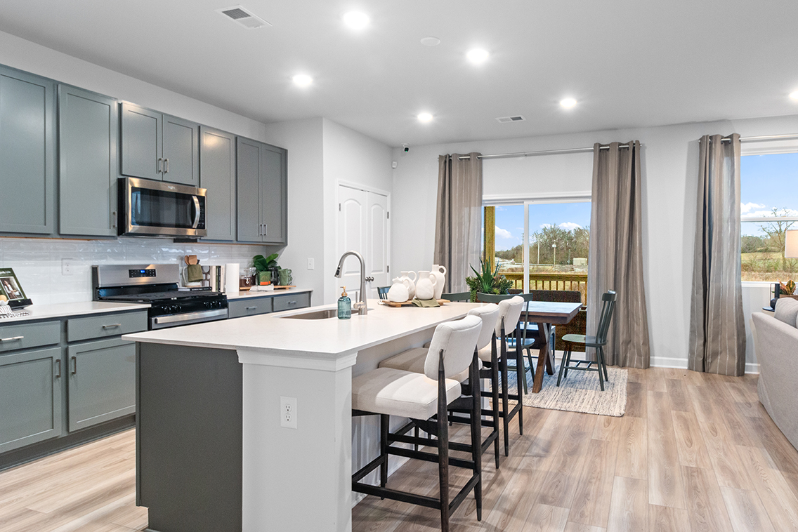 A kitchen with a large island.