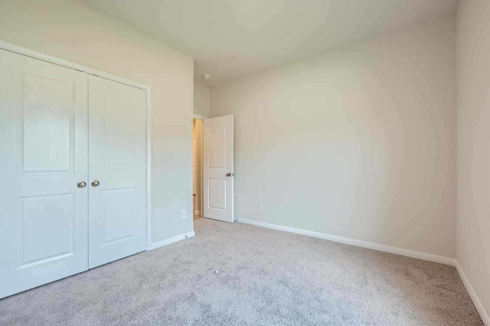 A room with white doors.