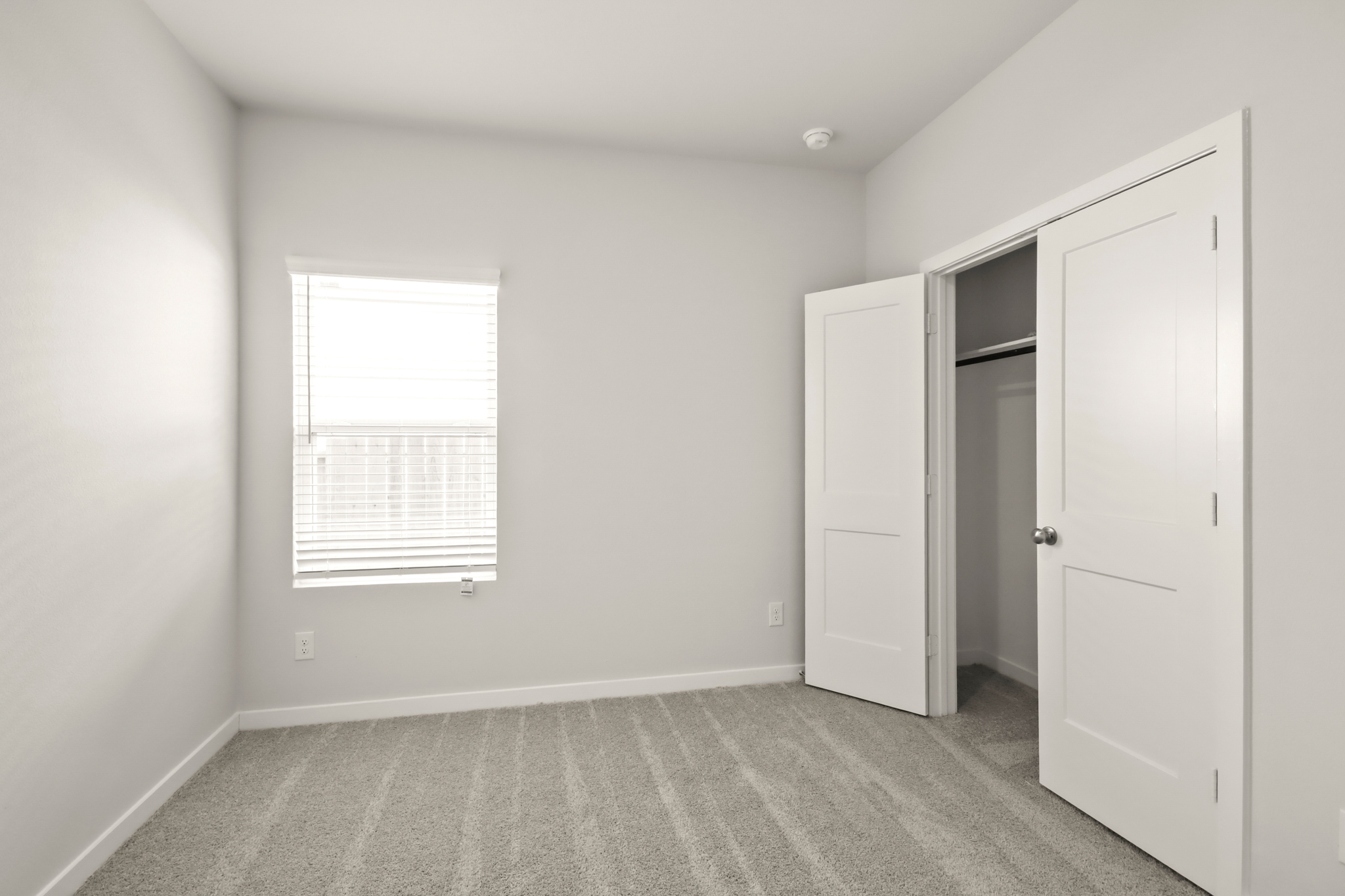 A room with white doors.