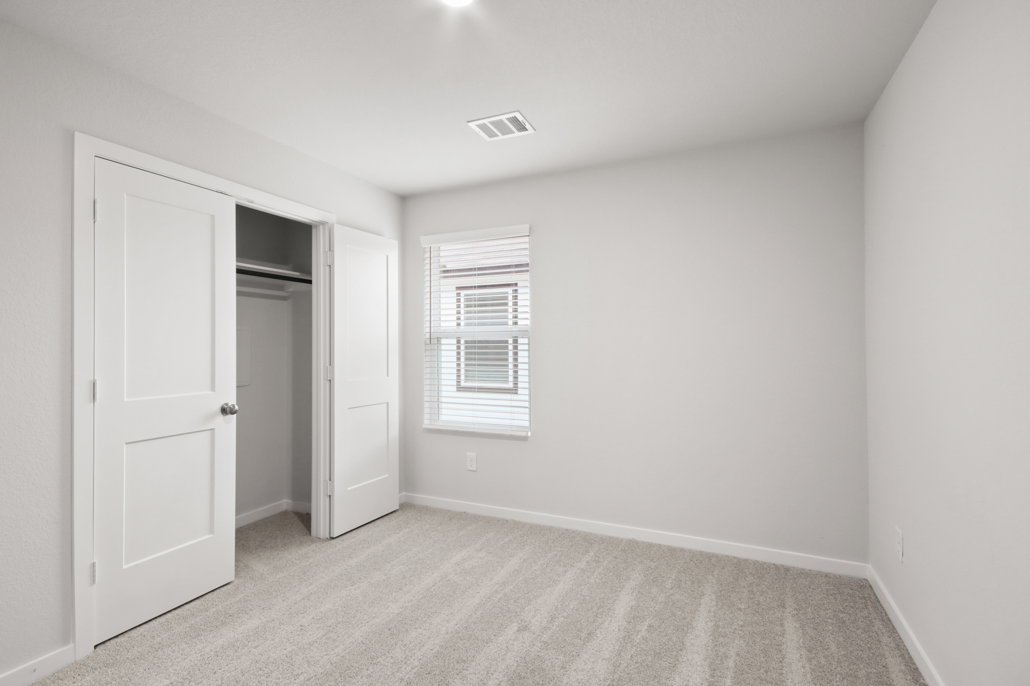 A room with white doors.