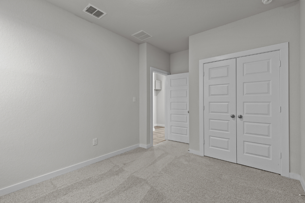 A room with white doors.