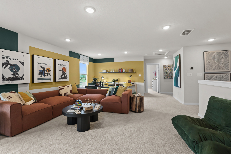 A living room with a couch and a coffee table.