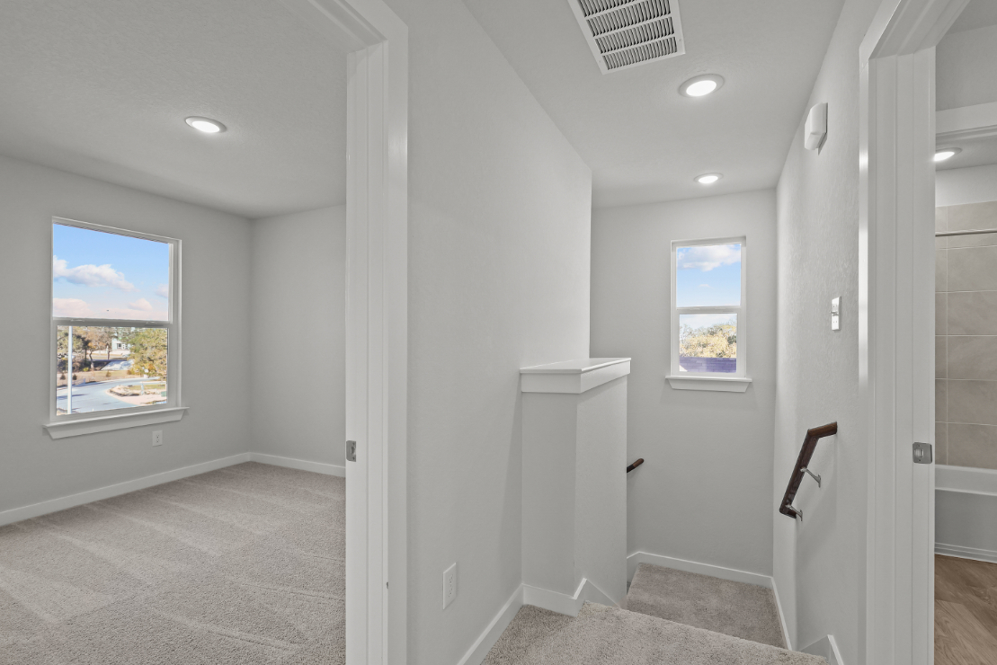 A bathroom with a window.