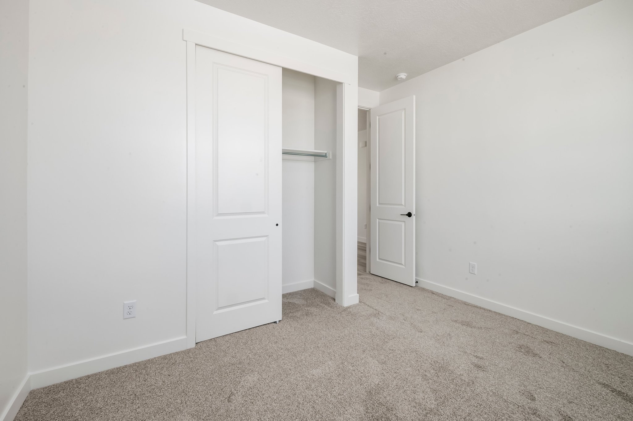A room with white doors.