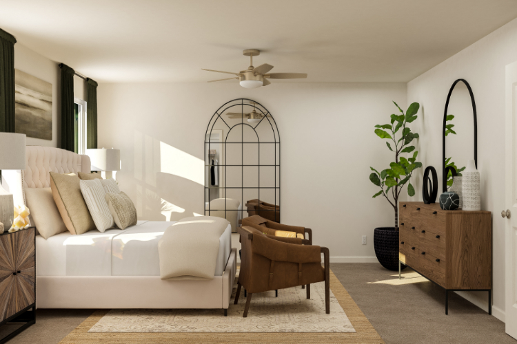 A living room with a white couch and a white table.