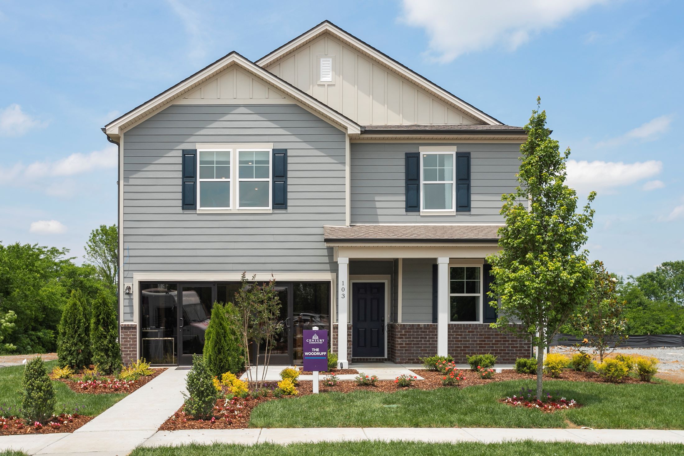 A house with a large front yard.